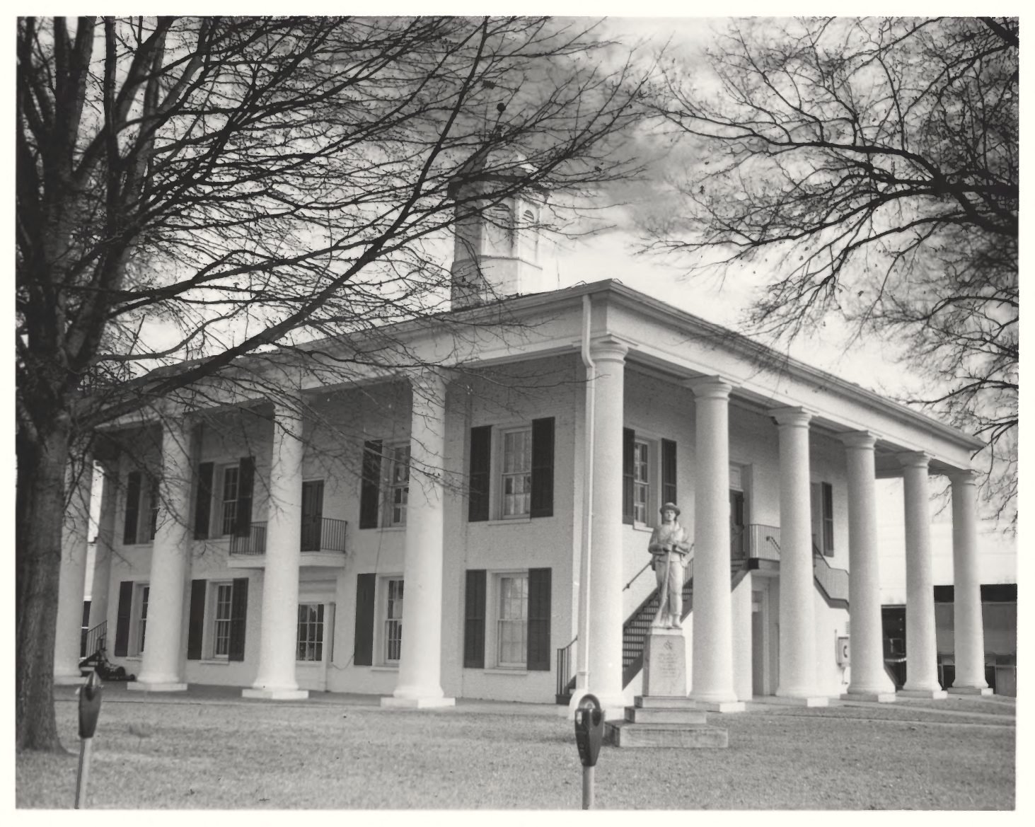 Black and white photograph of the columned Claiborne Parish Courthouse