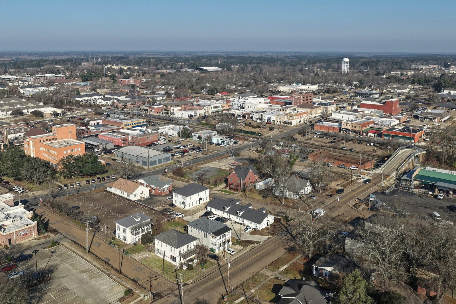 Aerial view over Ruston with brick buildings, houses and the water tower